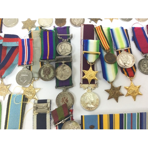 1537 - A collection of miniature British and other war medals including South Africa campaign medal, Braver... 