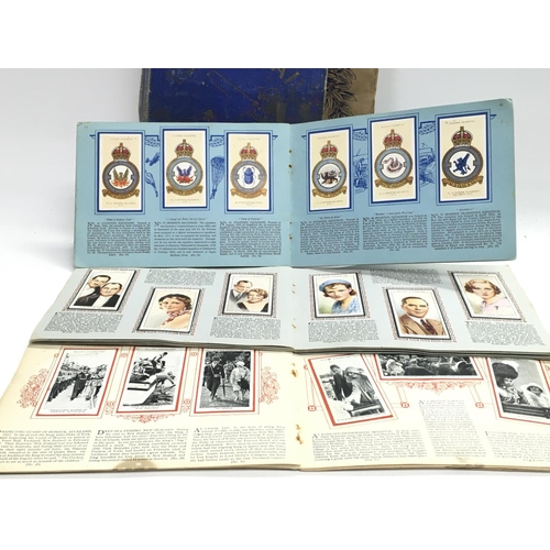 1651 - A Collection of stamp and cigarette card albums including Players, Wills etc. no reserve postage cat... 