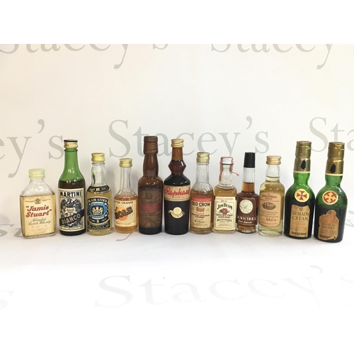 1801 - A collection of miniature spirits including Jamie Stuart, Blair Athol, Old Crow, Strathspey Malt, Ar... 