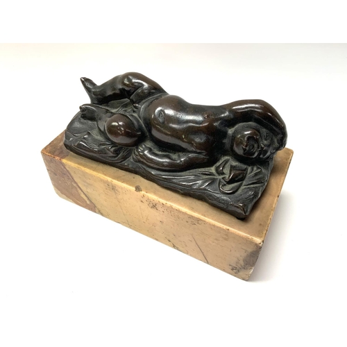 700 - A 19thC bronze figure of a sleeping child mounted on a marble base. (Unsigned) 14cm x 7cm x 9cm (B)