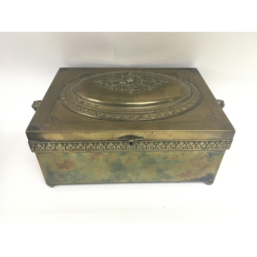 717 - An art nouveau brass box.