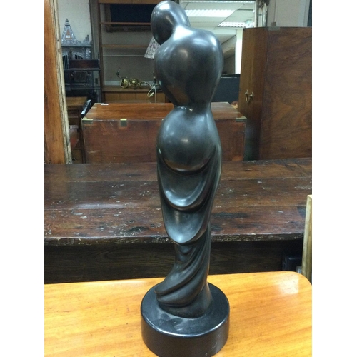 733 - A limited edition modern bronze of a female form on a circular marble base indistinctly signed , 62c... 