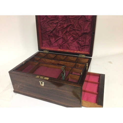 737 - A quality late Victorian Rosewood jewellery box with a well fitted interior the side with a sprung d... 