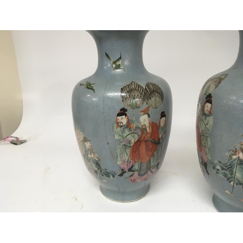 811 - A Pair of Chinese Export porcelain vases. With four caricature marks Yongzheng 1723-1736. Considered... 