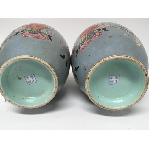 811 - A Pair of Chinese Export porcelain vases. With four caricature marks Yongzheng 1723-1736. Considered... 