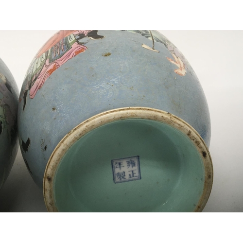 811 - A Pair of Chinese Export porcelain vases. With four caricature marks Yongzheng 1723-1736. Considered... 