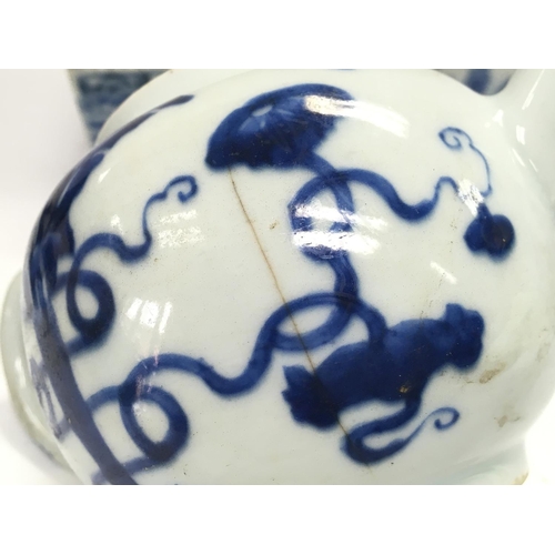 818 - A collection of Chinese blue and white ceramics including a sauce jug with floral and bird design, a... 