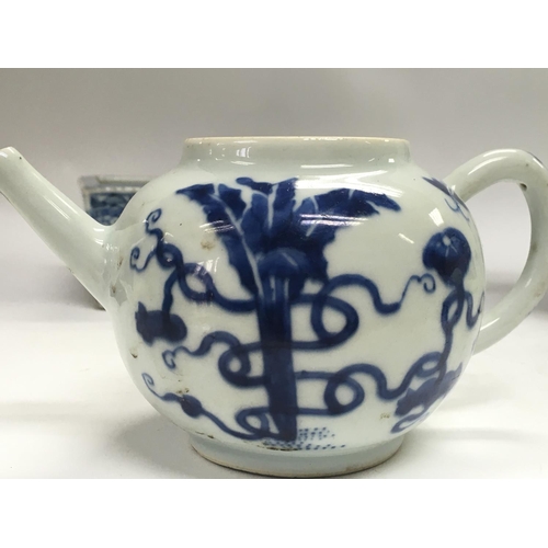 818 - A collection of Chinese blue and white ceramics including a sauce jug with floral and bird design, a... 