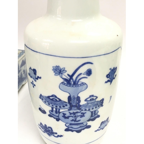 818 - A collection of Chinese blue and white ceramics including a sauce jug with floral and bird design, a... 