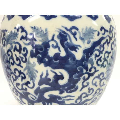 821 - A Chinese blue and white Phoenix porcelain vase. 13cm tall. This lot cannot be posted.