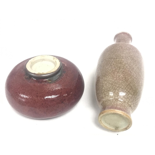 824 - A Chinese glazed vase and a Sang De Bouef vase. No obvious damage or restoration. 15 and 5cm tall. T... 