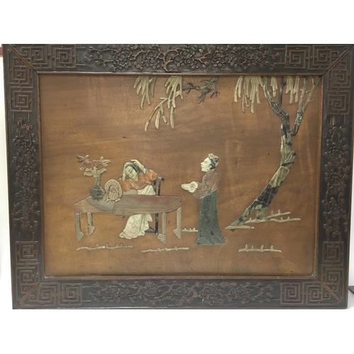 841 - A carved Chinese soapstone wooden panel 65x51cm. This lot cannot be posted