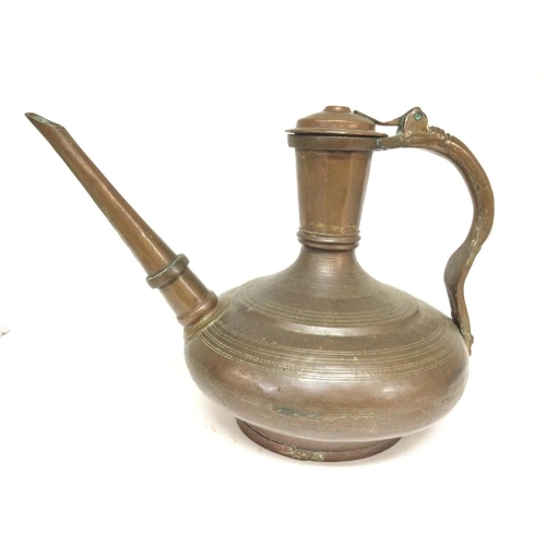 845 - A Persian Bronze Jug. Approx Height 32 Cm.