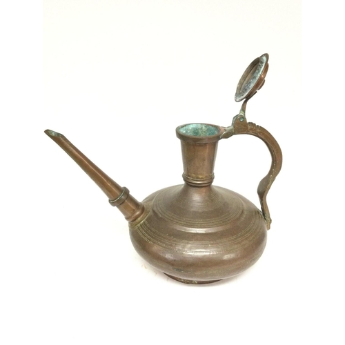 845 - A Persian Bronze Jug. Approx Height 32 Cm.