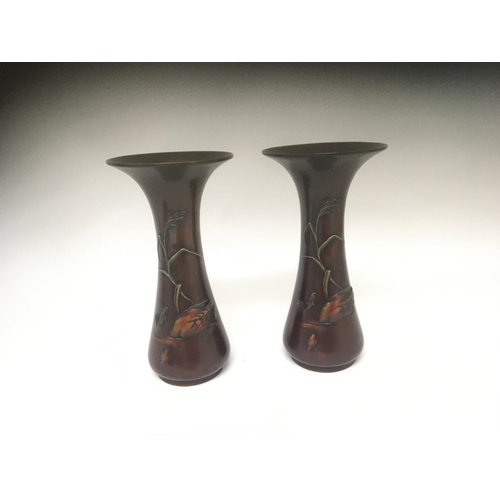 855 - A Pair of Japanese early 20th century bronze vases decorated with raised waterfowl with foliage. Hei... 