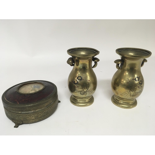 856 - A pair of Japanese brass vases with floral pattern and circular shaped trinket box (3)