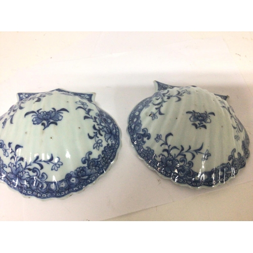 859 - Two 19th century Chinese Export porcelain shell shaped dishes some damage. Diameter 15cm.