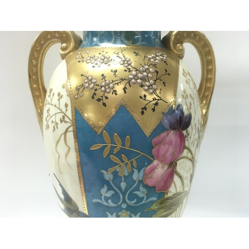 942 - A late 19th century continental vase 39cm tall. This lot cannot be posted