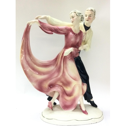 946 - A circa 1930 Katzhutte figure group , dancing couple. 32cm tall. This lot cannot be posted