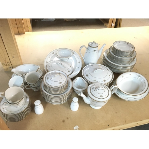 1026 - A Noritake dinner set including plates, dishes, cups etc. this lot cannot be posted