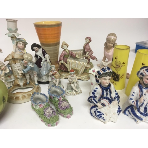 1031 - A collection of late 19th and early 20th century ceramics and glass including two Victorian nodding ... 