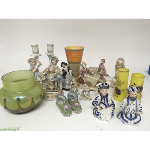 1031 - A collection of late 19th and early 20th century ceramics and glass including two Victorian nodding ... 