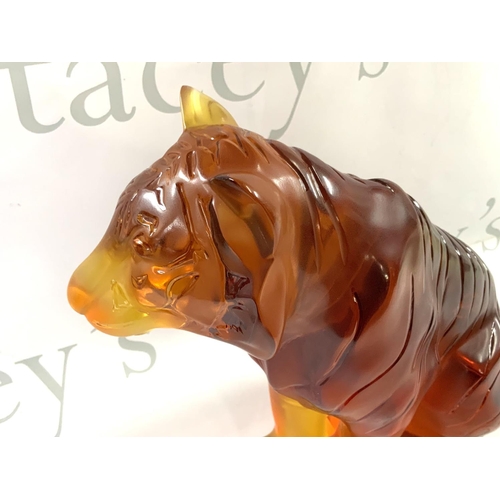 1060 - A large Lalique Amber glass tiger, 20th century, seated, overall decorated with black stripes, heigh... 