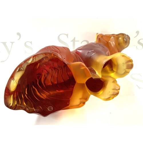 1060 - A large Lalique Amber glass tiger, 20th century, seated, overall decorated with black stripes, heigh... 