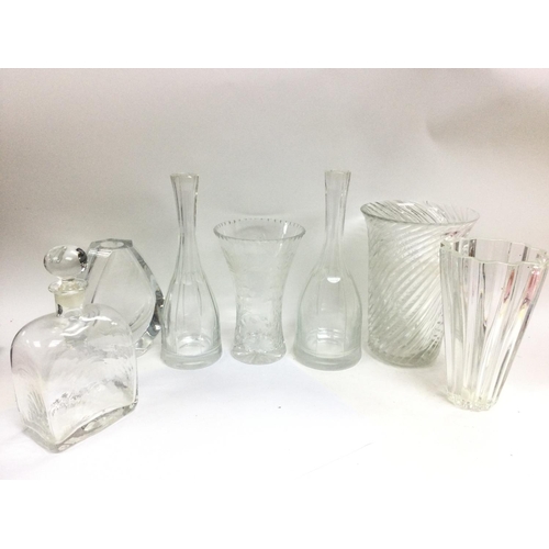 1068 - A collection of cut glass vases including Atlantis, Baccarat and others. 18 to 29cm tall. This lot c... 