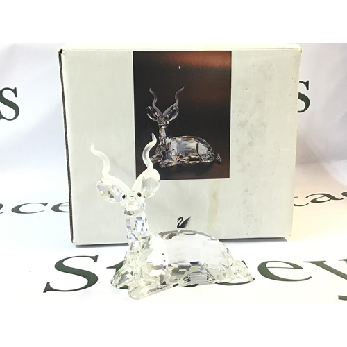 1073 - A boxed Swarovski Africa 1994 Kudu Crystal glass figure. Approximately 9.5cm tall. No obvious damage... 