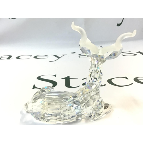 1073 - A boxed Swarovski Africa 1994 Kudu Crystal glass figure. Approximately 9.5cm tall. No obvious damage... 