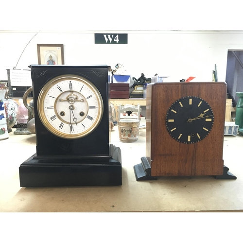 1303 - Two mantle clocks, slate and wooden. Dimensions 16x27x32cm & 10x29x28cm This lot cannot be posted. N... 