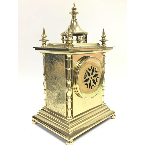 1306 - A French brass mantel clock maker S Marti with ornate engraved decoration and a painted porcelain ro... 