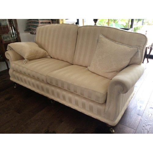 1320 - A Fine quality three seater sofa tastefully upholstered in yellow fabric with matching scatter cushi... 