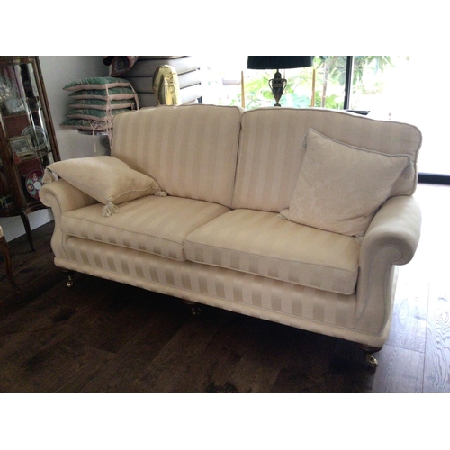 1320 - A Fine quality three seater sofa tastefully upholstered in yellow fabric with matching scatter cushi... 