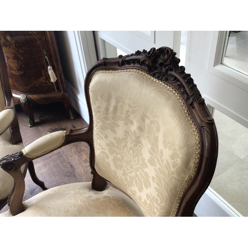 1321 - A pair of quality French Louis XVI style carved wood open arm chairs the top rail with folate scroll... 