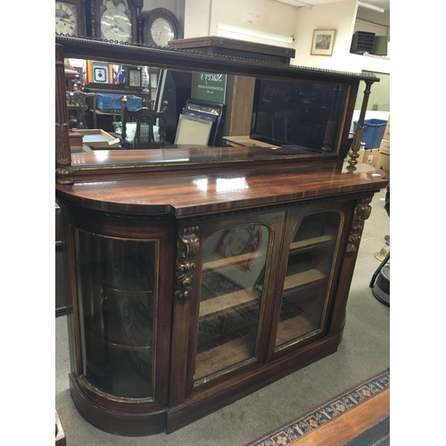 1350 - A Quality Early Victorian Walnut credenza with a raised mirrored back with gilded pillar supports ab... 