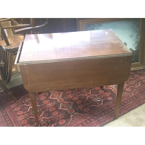 1397 - A Mahogany Pembroke table the twin flap top with boxwood banding fitted with an oak lined drawer.