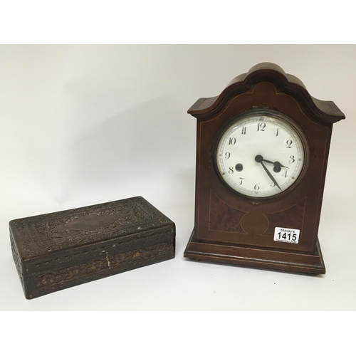 1415 - An Early 20th century walnut clock with an enamel dial. and a profusely carved and inlaid box (2)