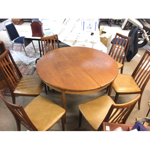 1418 - A G-Plan dining table and chairs. Table dimensions 72cm tall, width 120