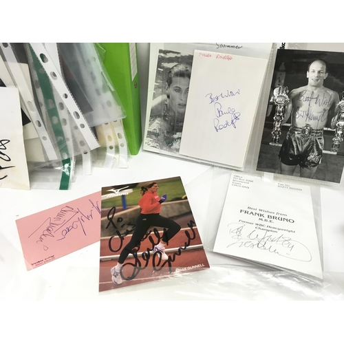 1834 - A Collection of autographs of famous athletes including Henry Cooper, Jackie Stewart, Chris Eubank, ... 