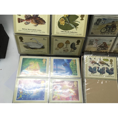 1881 - A collection of stamp post cards and an album of first day covers. Postage B