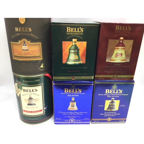 2015 - A collection of 6 bottles of commemorative editions of bells Whisky.