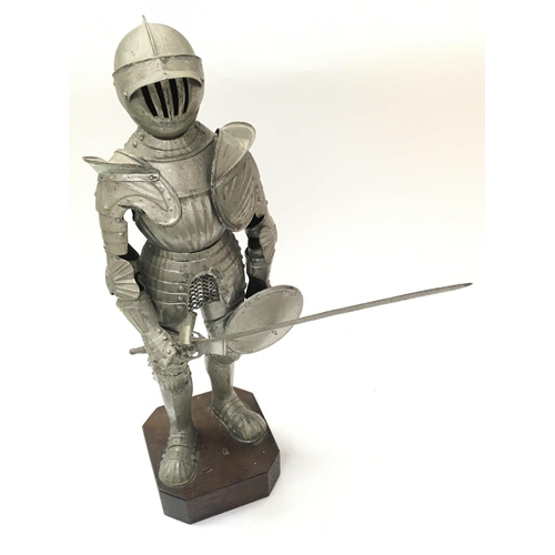 2022 - A miniature Medieval suit of armour with longsword and shield , 43cm tall. Postage category C