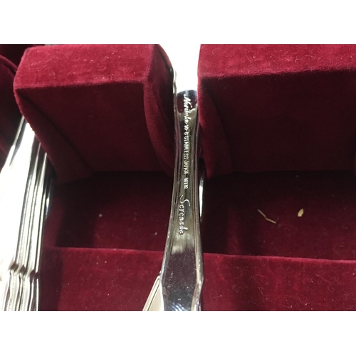 2035 - Canteen of Noritake Serenada stainless silver cutlery including knives, forks and spoons. Postage ca... 