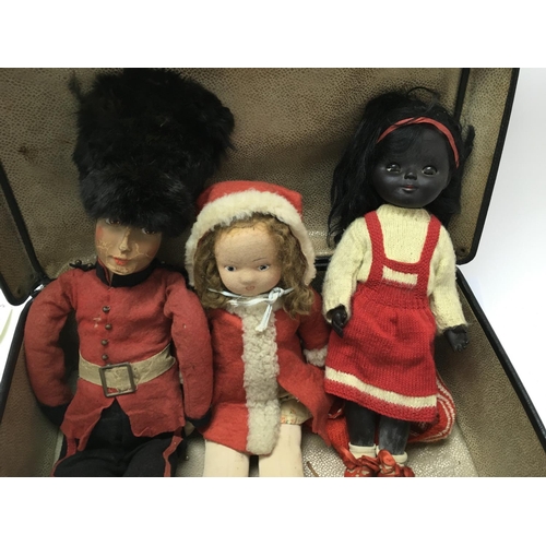 2103 - A collection of various vintage dolls. Postage C