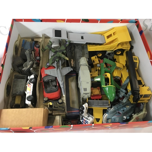 2111 - A collection of Playworn toys. Including miniature toy cars and other vehicles and a boxed helicopte... 