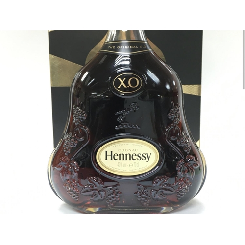 808 - A boxed bottle of Hennessy XO limited edition, 70cl. This lot cannot be posted