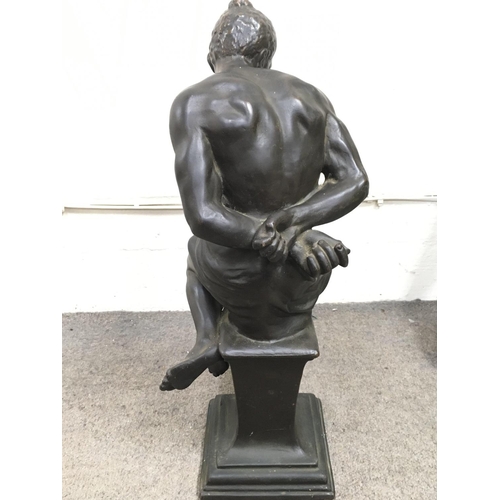 809 - A bronze lamp base figure of a seated man in captivity. 50cm tall approximately. This lot cannot be ... 