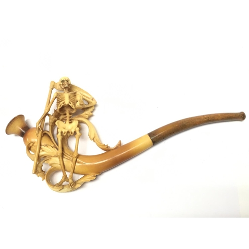 810 - A cased skeleton tobacco pipe